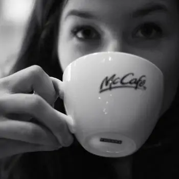 girl drinking McDonald’s coffee